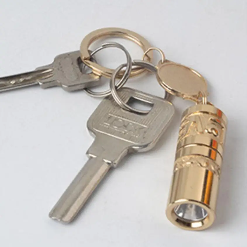 

2017 Golden Mini Portable LED Flashlight Torch Lamp Handheld Camping Keychain Light 728