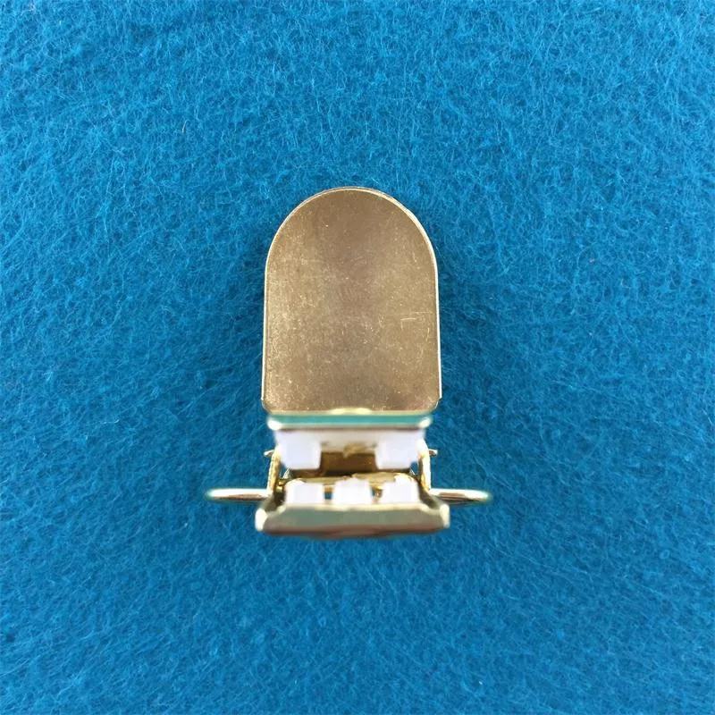grampos de suspensórios de cor dourada de com inserção de dentes de dip