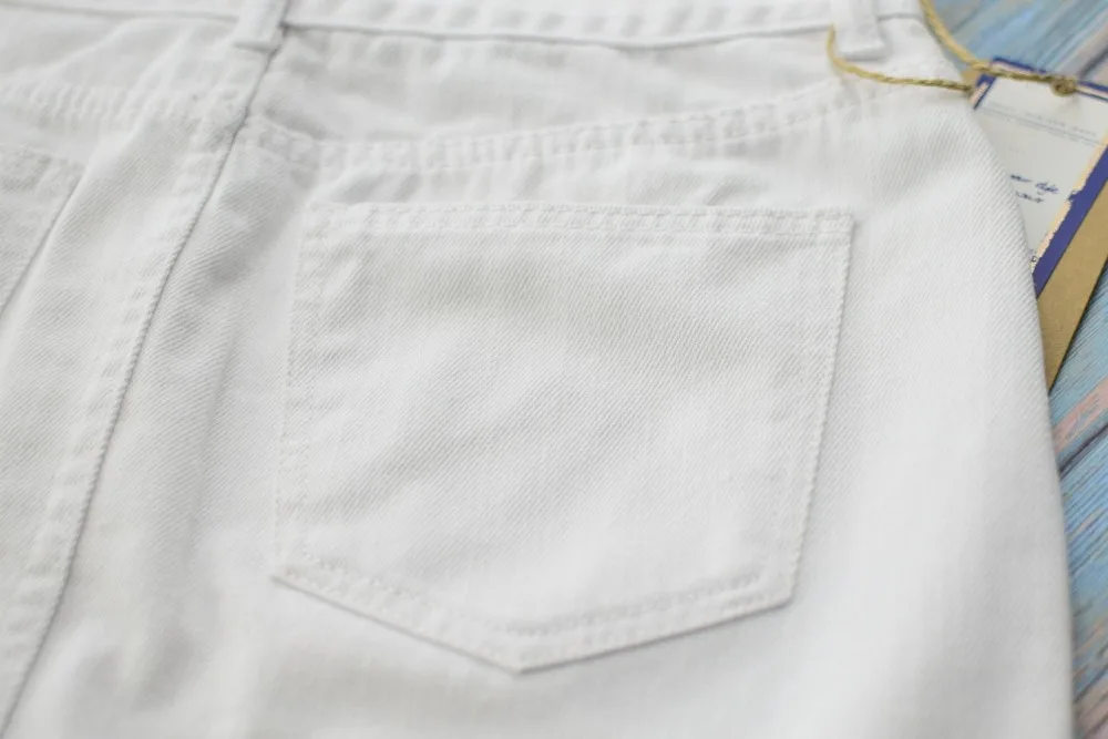 Women's high waist hip half skirt in pure white irregular worn foot tassel spring summer popular wild (24)