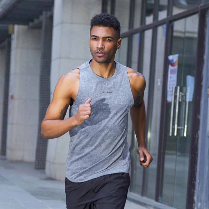

2019 New Gym Men Vest Muscle Bodybuilding Tank Top Sleeveless Sport Fitness Running Vest Tight Shirt Running Cotton Workout Vest
