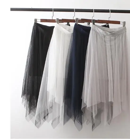 

autumn and winter new women's students loose waist wild irregular pompon net yarn skirt black skirts
