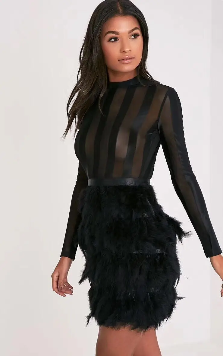 black dress with feathers on bottom