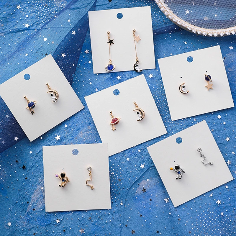 

AOMU S925 Sterling Silver Pin Asymmetry Lovely Blue Universe Planet Crystal Star Moon Astronaut Stud Earring For Women Girl Gift