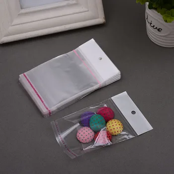 

Small 7*10cm Clear Self Adhesive Seal Plastic Bag OPP Poly Bag Plastic Event Package Bag W/ Hang Hole Wholesale 500Pcs/Lot