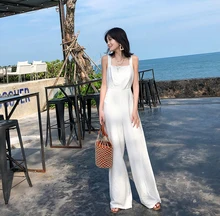 Spring and summer new style Slim high waist wide leg jumpsuit Beach holiday beach jumpsuit White open back waistline jumpsuit Spring and summer new style Slim high waist wide leg jumpsuit Beach holiday beach jumpsuit White open back waistline jumpsuit