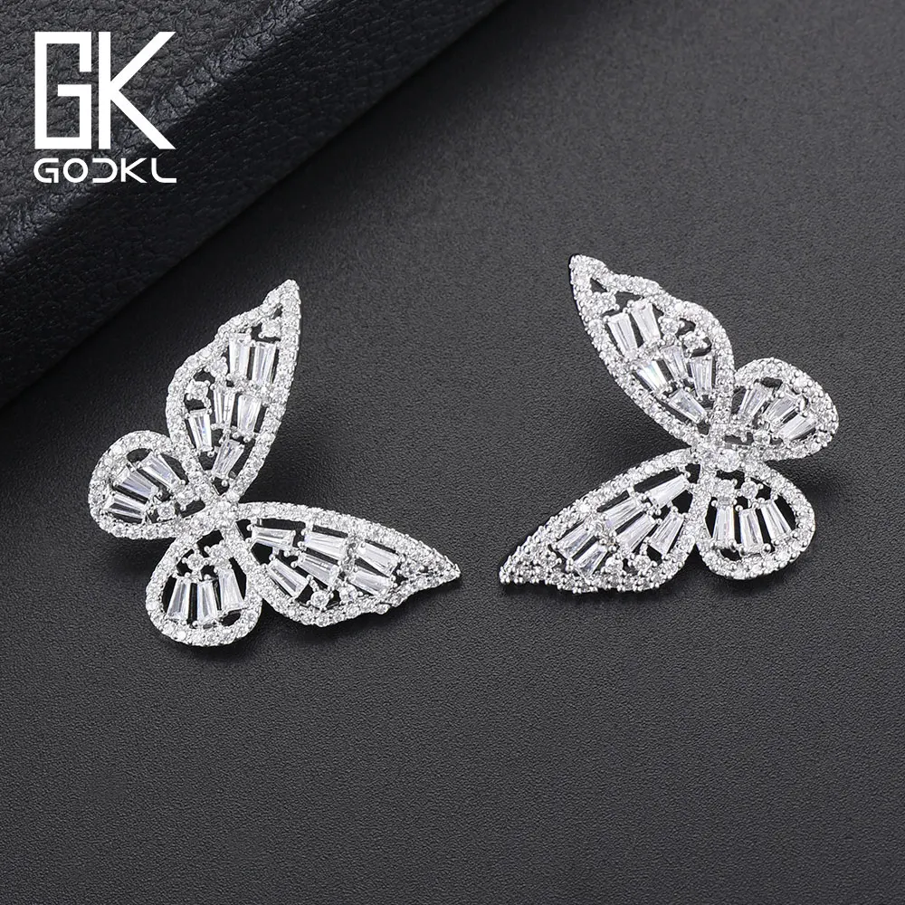 Tanie GODKI moda koreański Butterfly stadniny kolczyki dla kobiet ślub cyrkonia kryształ czeski dubaj Bridal srebro stadniny kolczyki