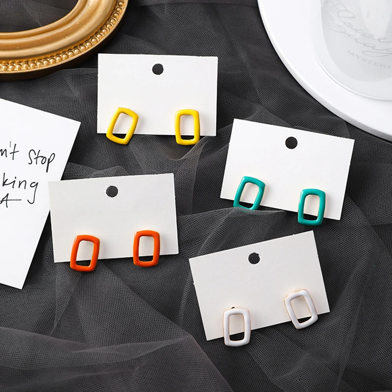 

HUANZHI New Multicolor Dropping Glaze Small Hollow Geometric Rectangle Stud Earrings for Women Wedding Party Travel Jewelry