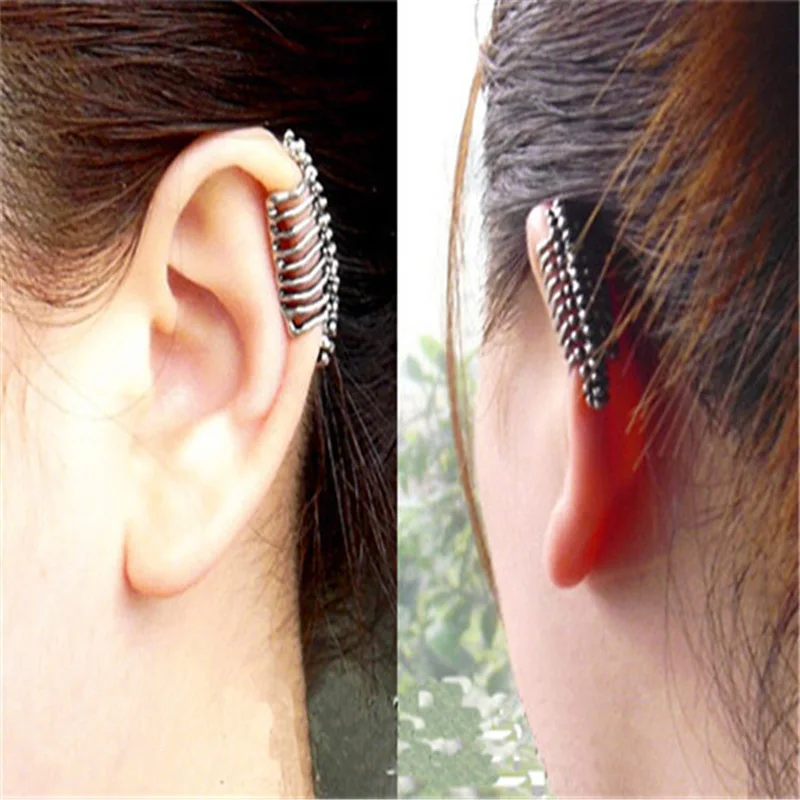 

2019 new punk wind cool skeleton spine ear clip ear studs men and women without earrings earrings jewelry wholesale