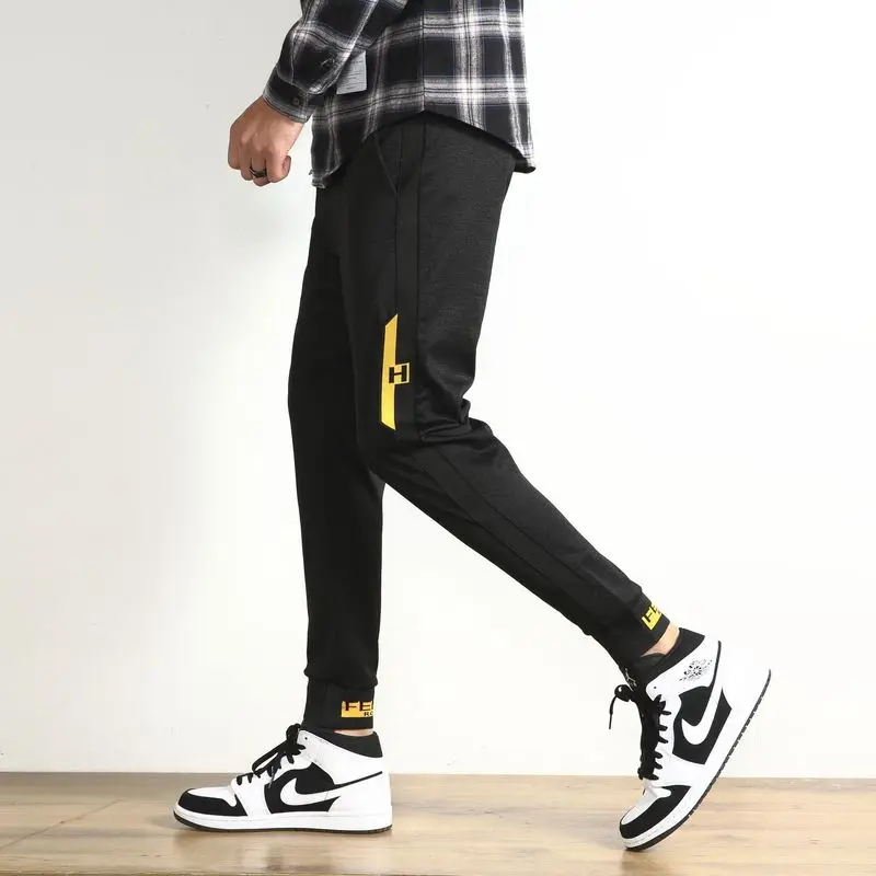 2019 spring men's sports casual pants new black elastic waist elastic beam feet feet pants tide brand Slim casual pants male 2019 spring men's sports casual pants new black elastic waist elastic beam feet feet pants tide brand Slim casual pants male