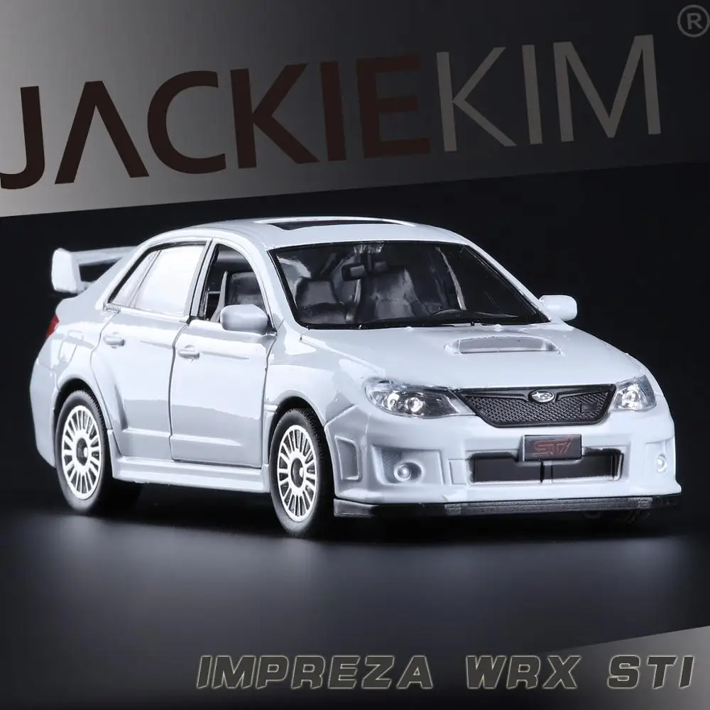 Модель автомобиля Subaru Impreza в масштабе 1:36 металлическая 2 открытые двери