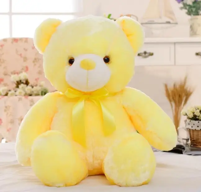 yellow and white teddy bear