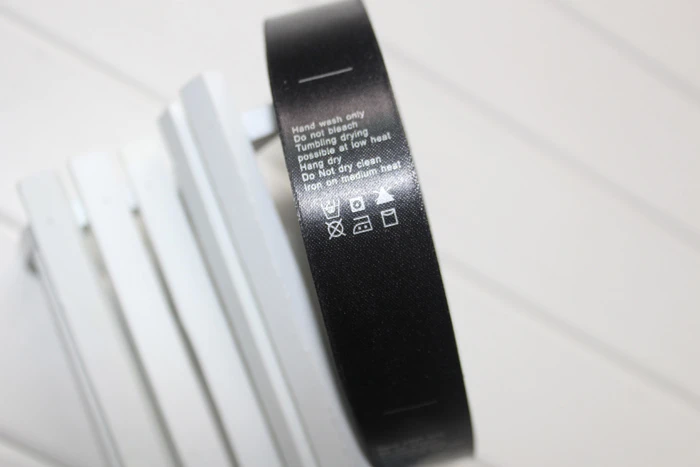 black labels with white print