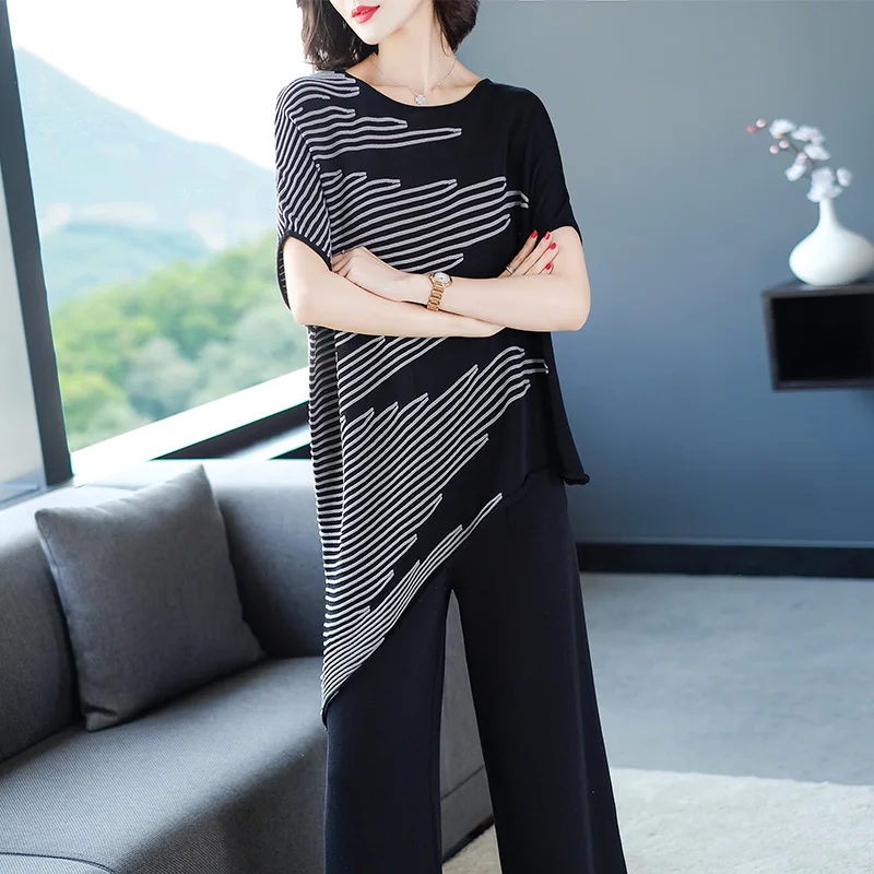 XL Merk Sets 2019 Zomer Vrouwen Pak Nieuwe Commuter OL Pak O-hals Onregelmatige Bat Tee + Negen Punten Wijde Pijpen broek 2 Delige Pakken XL Merk Sets 2019 Zomer Vrouwen Pak Nieuwe Commuter OL Pak O-hals Onregelmatige Bat Tee + Negen Punten Wijde Pijpen broek 2 Delige Pakken