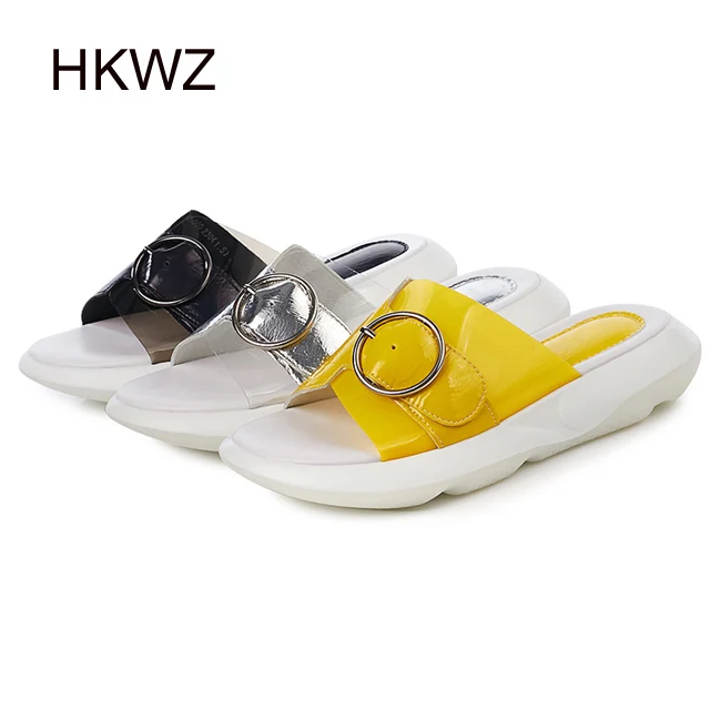 

2019 brand new flat bottom round belt buckle one word open toe slipper thick bottom flat transparent women's fashion wild sandal