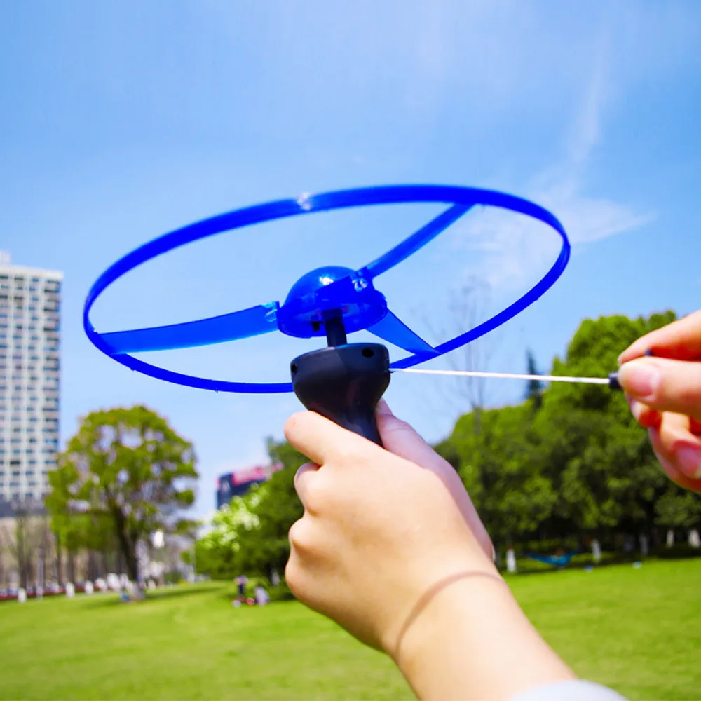 2019 حار بيع الاطفال اللعب ضوء فلاش اللعب مضحك الملونة سحب سلسلة UFO مصباح ليد Up تحلق الصحن القرص الاطفال لعبة 5.29