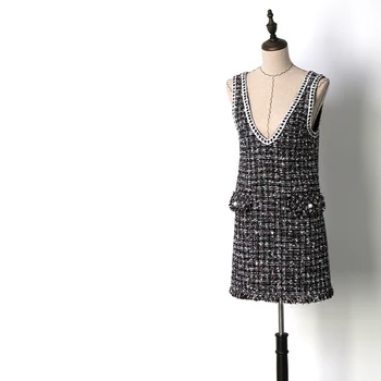 

New QZ8518008 2019 spring summer loose commuter little fragrant wind V collar dress.