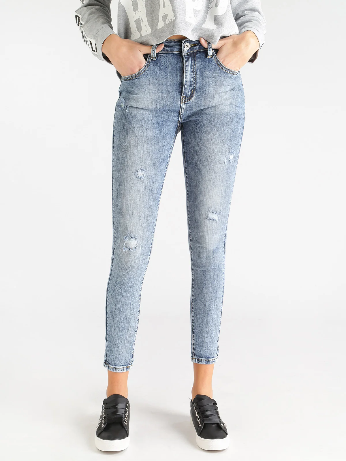 ripped tight blue jeans with the cuff