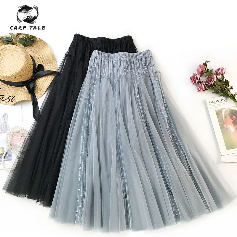 

Hollow jacquard wave point mesh skirt female Korean version of the high waist large swing skirt retro temperament gentle wind