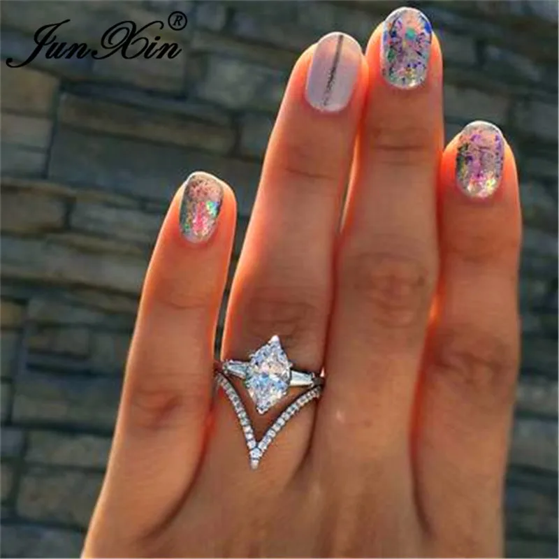 

JUNXIN Boho White aaa Zircon Wave Rings For Women 925 Silver Filled Birthstone Wedding Ring Female Chevron Ring Engagement Gifts