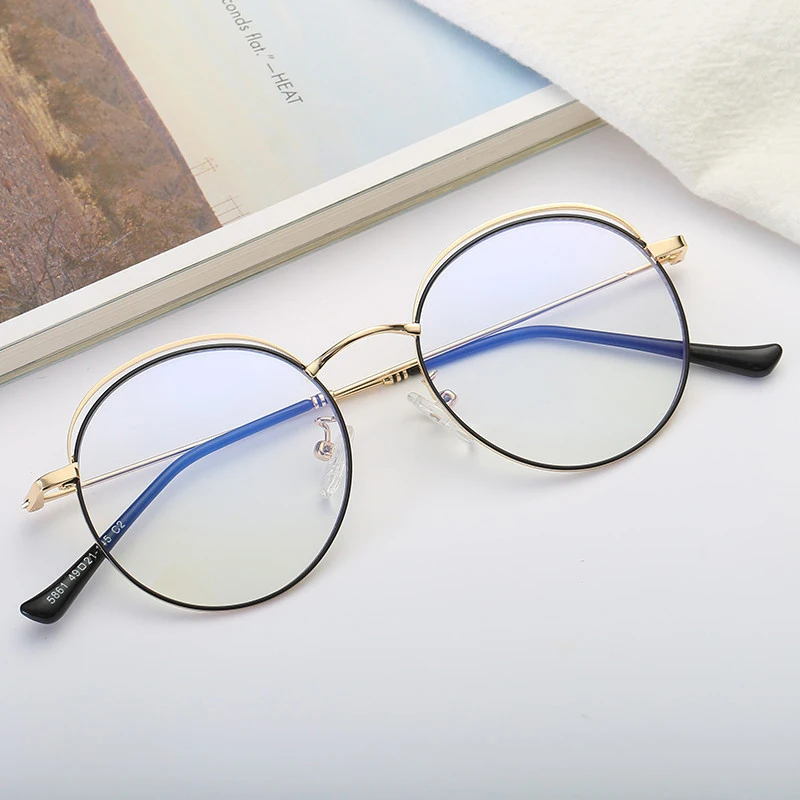 

Stylish and beautiful round frame anti-Blu-ray glasses Retro trend metal glasses frame for men and women literary flat mirror.