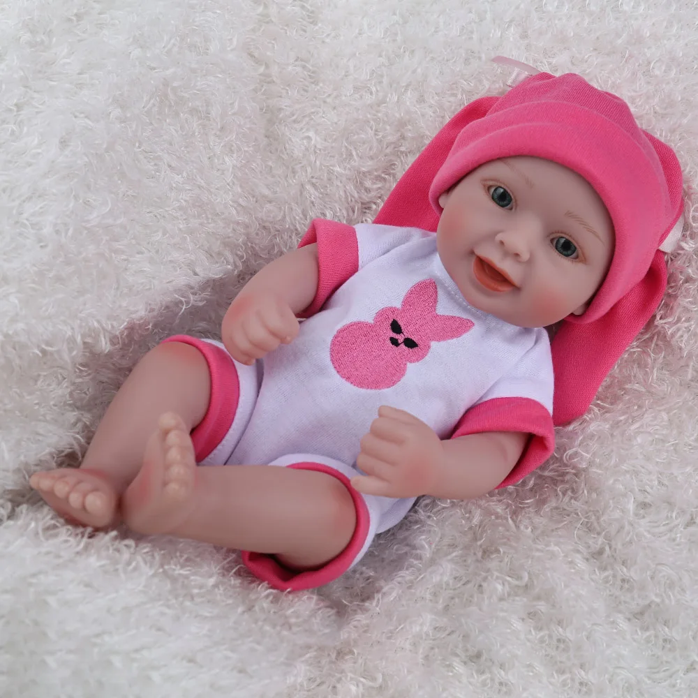 

Reborn Baby Doll Girl hand-painted Style Doll Girl Style baby with a pink hat lovely handmade girl from our NPK DOLL store