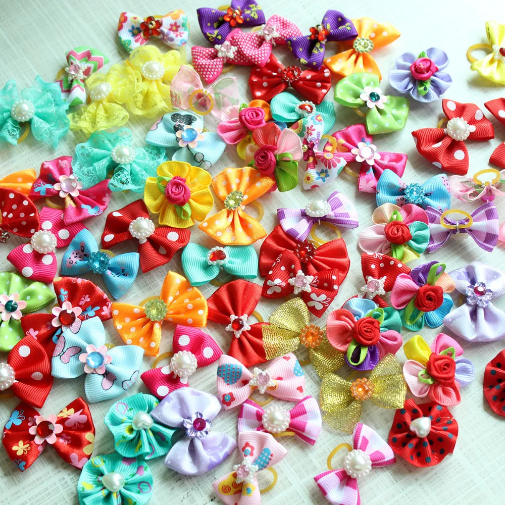 

100pcs Pet Supplies Dog Grooming Bows Rhinestone Pearls Pet Dog Hair Bows Pet grooming Accessories Rubber Bands Pet Products