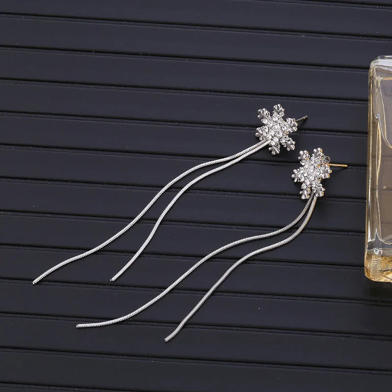 

New copper inlaid zircon snowflake earrings fashion temperament silver needle tassel earrings not allergic women's earrings