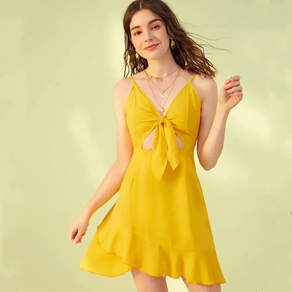

Russia Free shipping Explosive Lotus Leaf Sexy Sling Dress Commute Camisole Pure color Hollowing out V collar Bow Irregular