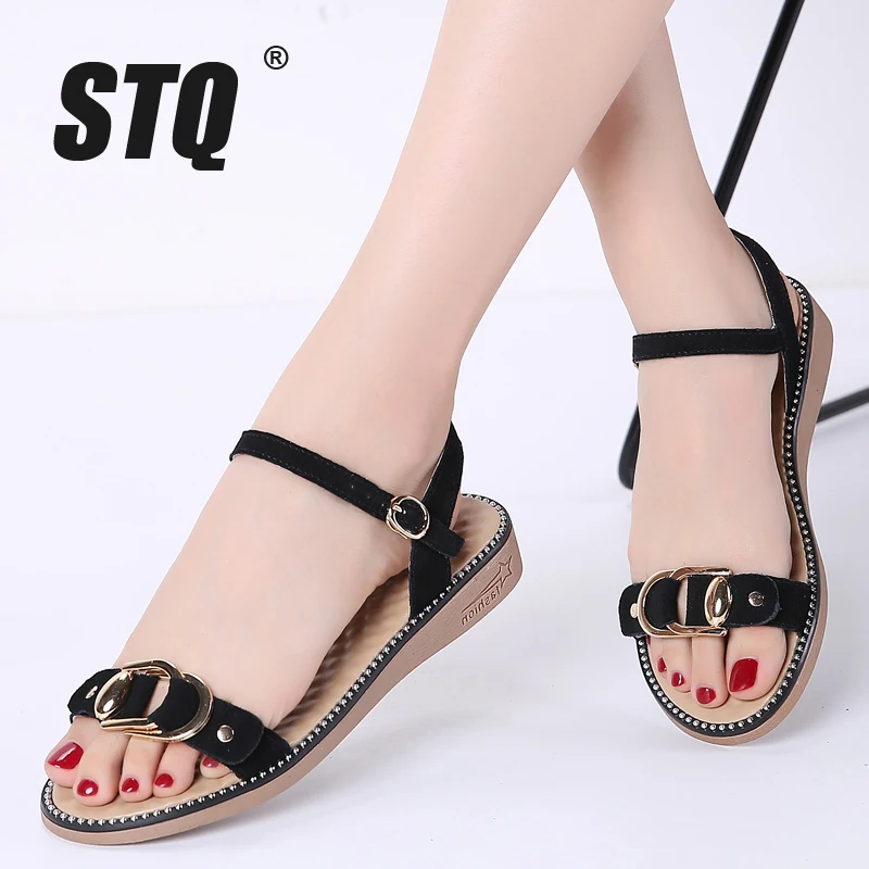 black and gold flat sandals