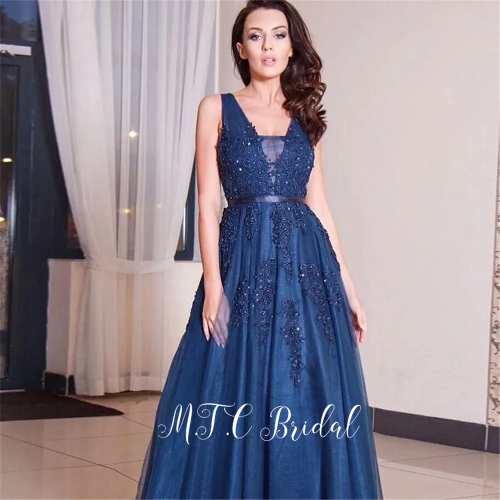 

Graceful Navy Blue Backless Arabic Evening Dress 2019 Gorgeous Beaded Appliques Tulle A Line Long Formal Dress Vestido De Festa