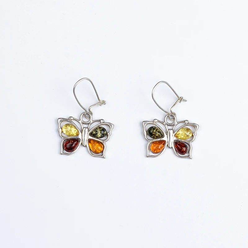 

JIUDUO jewelry Genuine luxury Smart wild blood Po earrings sterling silver egg-shaped amber