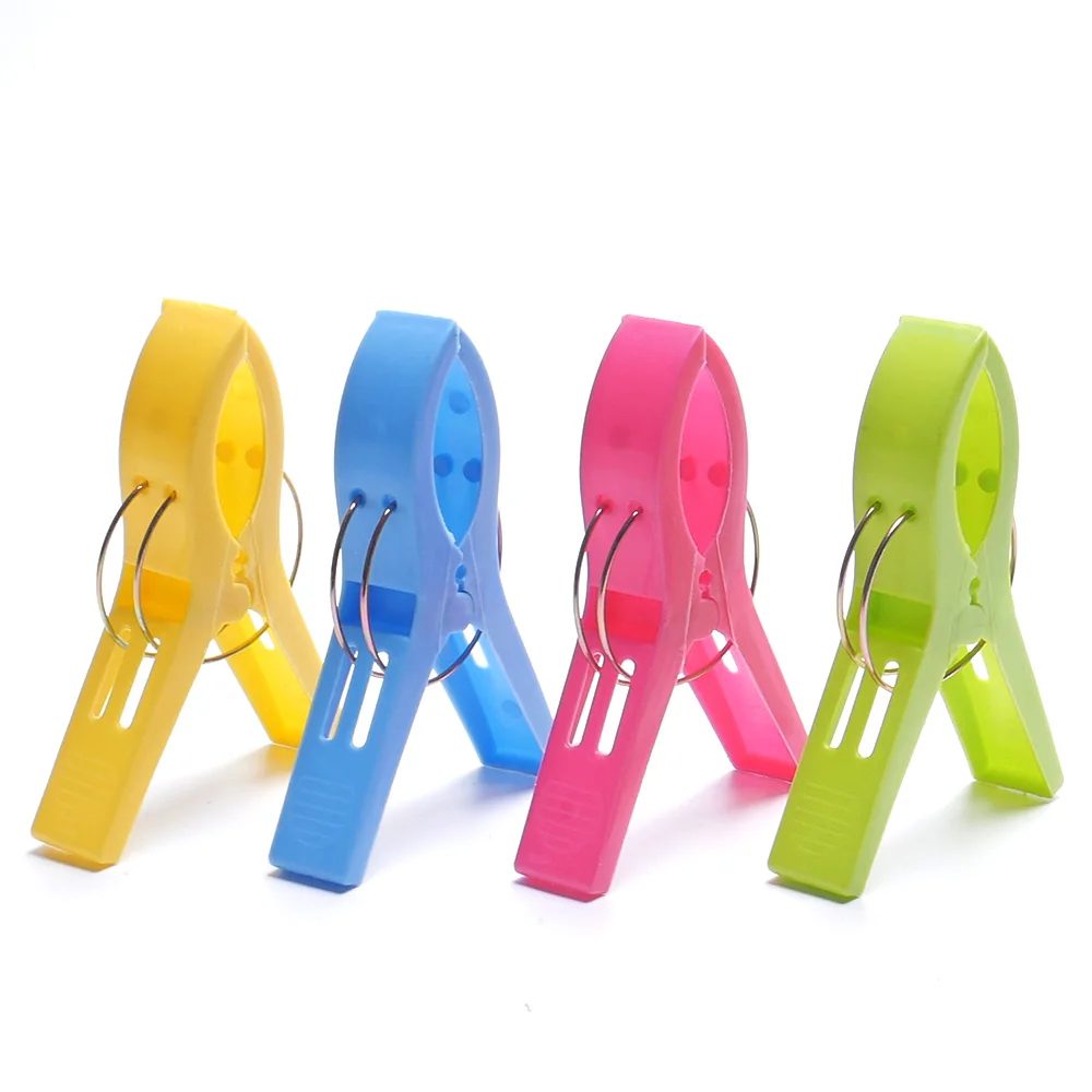 

4 pcs Large Sized Bright Color Plastic Beach Towel Clips Quilt Clips Well Made Plastic Clips Clothespin Laundry storage 2018