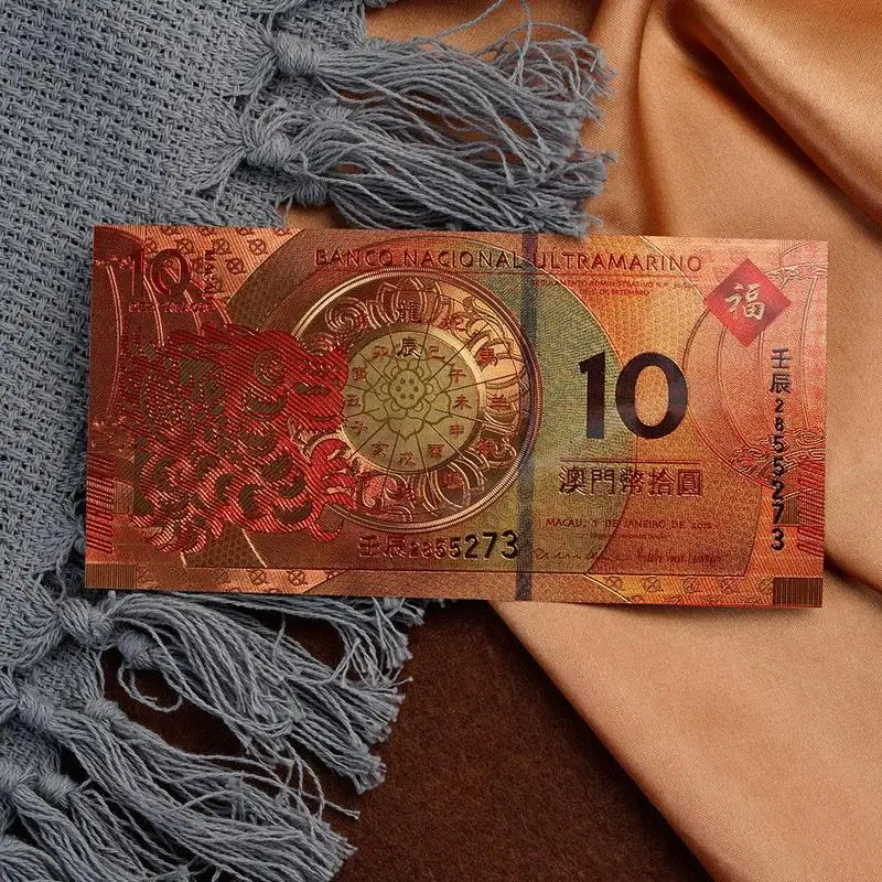 50pcs Macao 10 yuan Atlantic Banknotes Crafts golden plastic Foil paper money