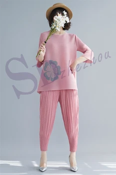 

European station new Miyake fold fabric set loose elastic size code plus size bell sleeve t-shirt + nine pants suit