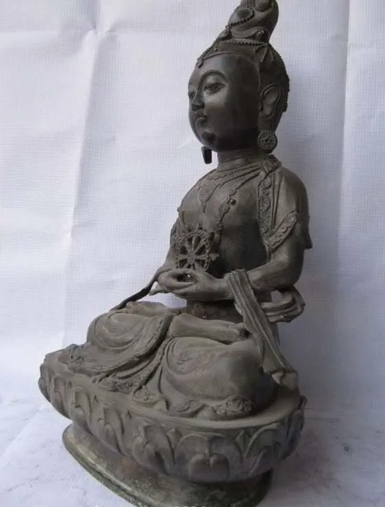

Chinese Tibet Carved Bronze hold wheel Kwan-yin Buddha statue