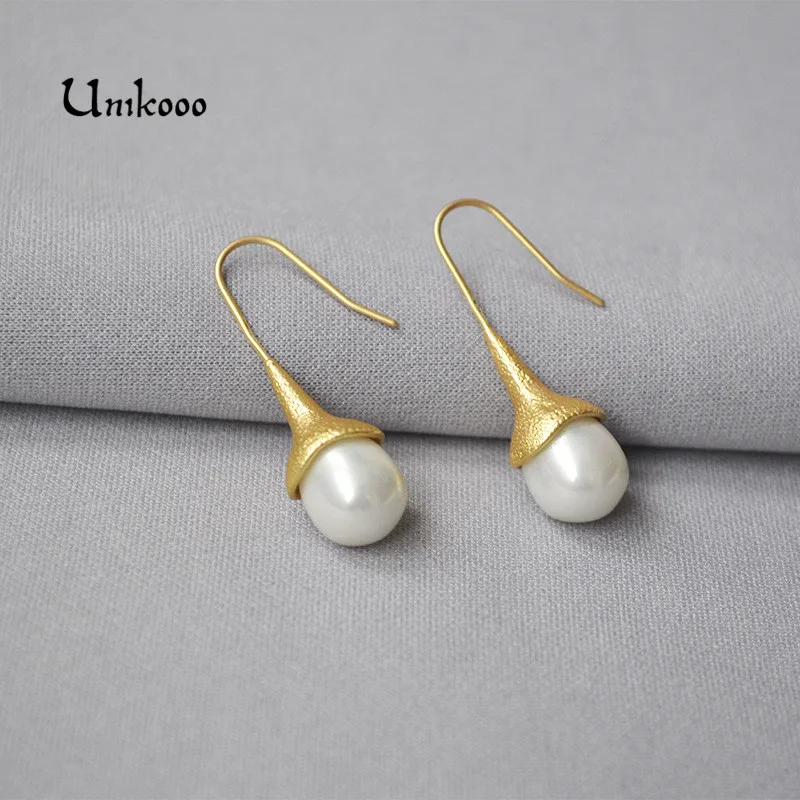 

Trendy Gold Metal Pearl Pendant Drop Earrings For Women Fashion Pearl Charm Statement Jewelry Wedding Earrings Female