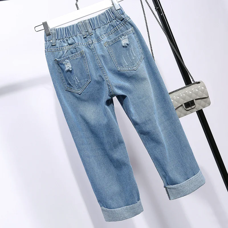 Большой размеры бриджи для женщин летние джинсовые до середины икры Длина рваные брюки стиля гранж прямые свободные укороченные джинсы
