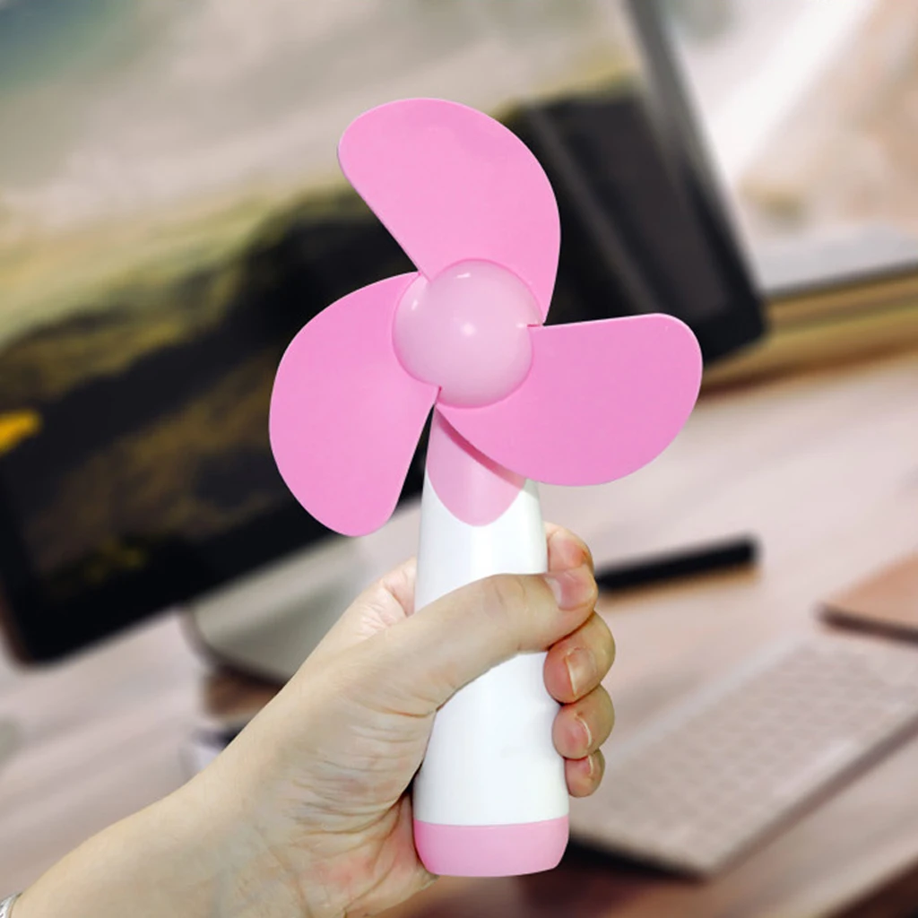

New Handheld Mini Fan Portable Super Mute Battery Operated for Cooling