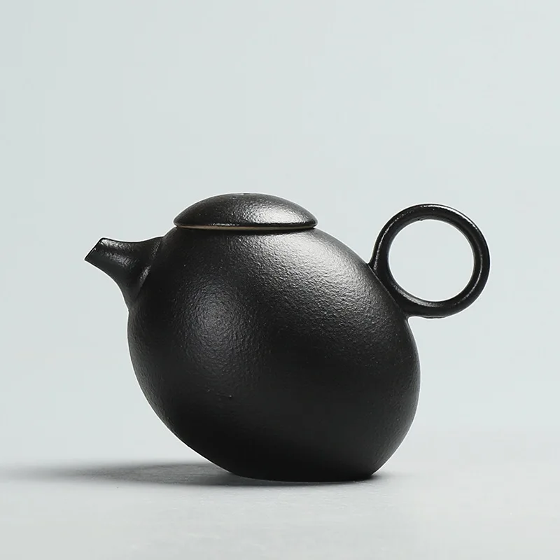 

Tea set Creative coarse pottery teapot tea is antique black clay Pu'er Kung Fu tea teapot
