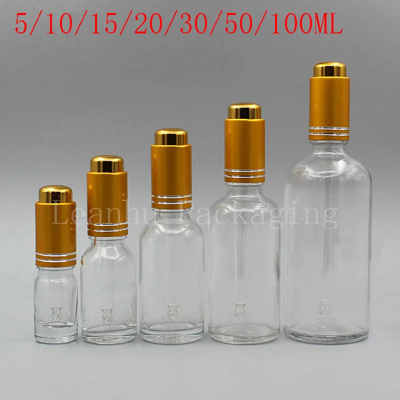 

Transparent Glass Bottle With Gold Dropper , Empty Cosmetic Container , Essential Oil / Essence / Perfume Sub-bottling