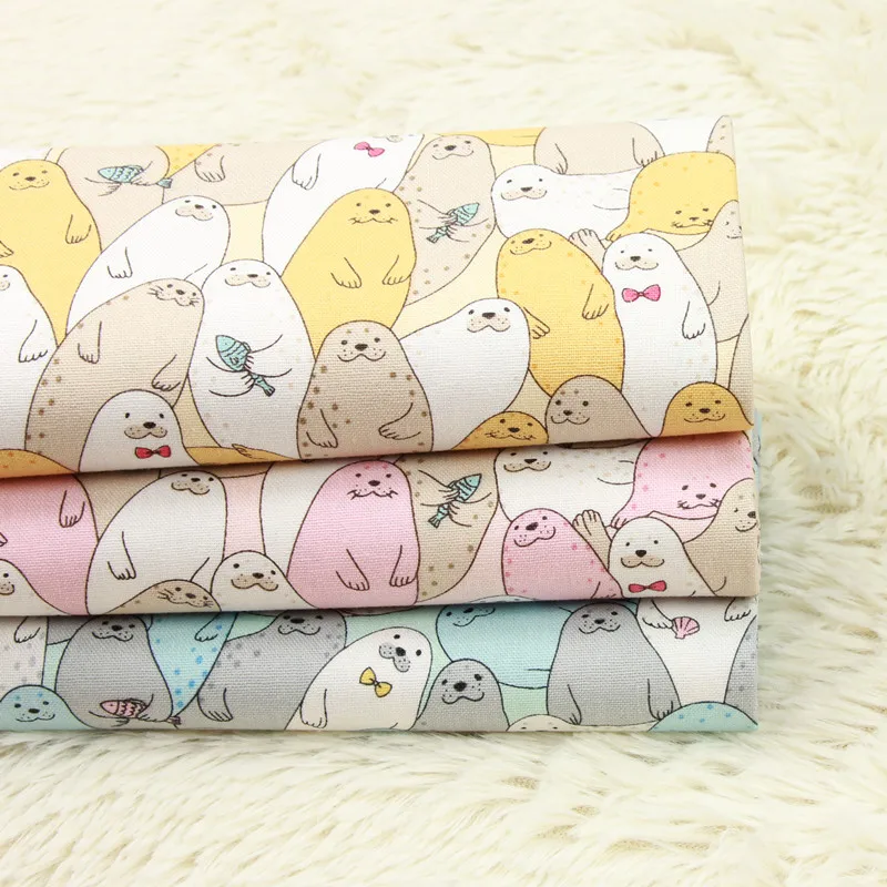 

half yard thicken cotton fabric with cartoon animal little seal print handmade DIY mouth gold package bag cloth 100% cotton B399
