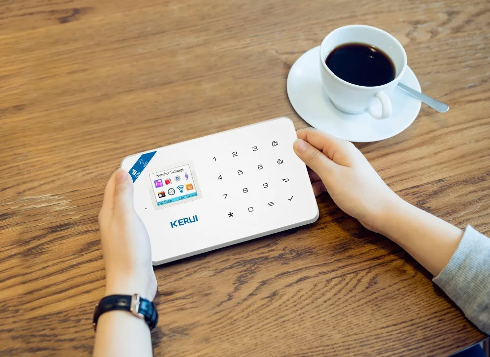 Охранная сигнализация KERUI с Wi Fi GSM IP камерой и управлением через