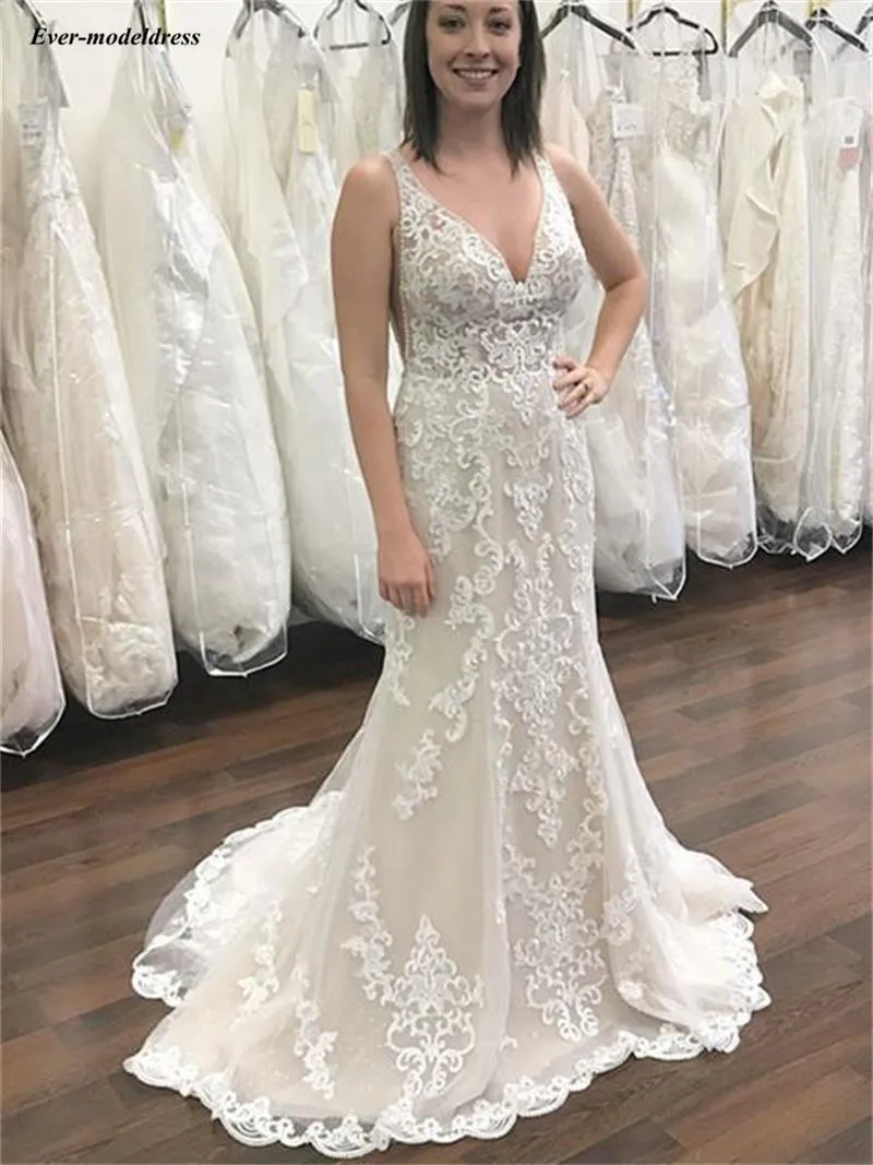 

Graceful Lace Mermaid Wedding Dresses Deep V-Neck Appliques Sleeveless Backless Garden Bridal Gowns Sweep Train 2019 Vestidos