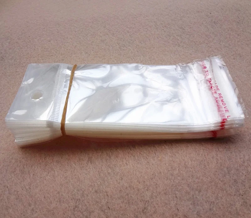 100pcs 7x14cm Clear Self Adhesive Seal Plastic Bags Transparent Resealable OPP Packing Poly Bags Pick Beads Hanging Holes