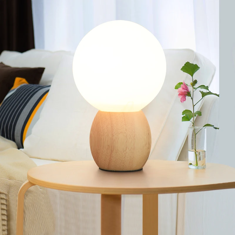 

The modern creative bedroom bedside lamp Nordic wood kids living room decoration round head table lamps LO72917
