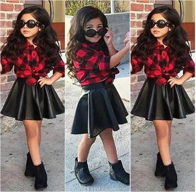 saia de couro e blusa xadrez