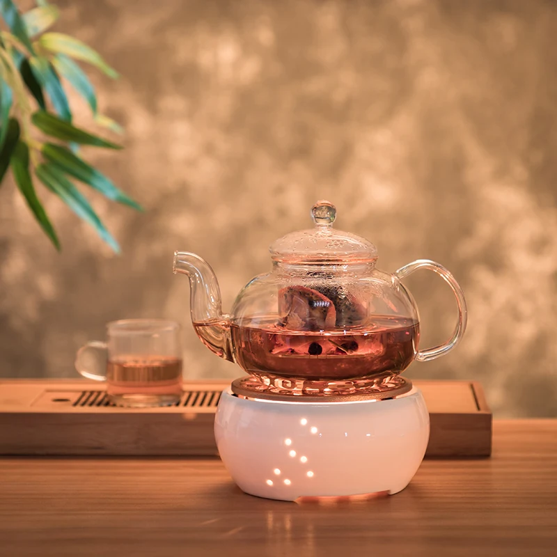 Billige Kreative Weiß Keramik Kerze Heizung Tee Topf Heizung Basis Gekocht Blume Tee Erhitzt Isolierung Basis Tee Zubehör Kaffee Wärmer