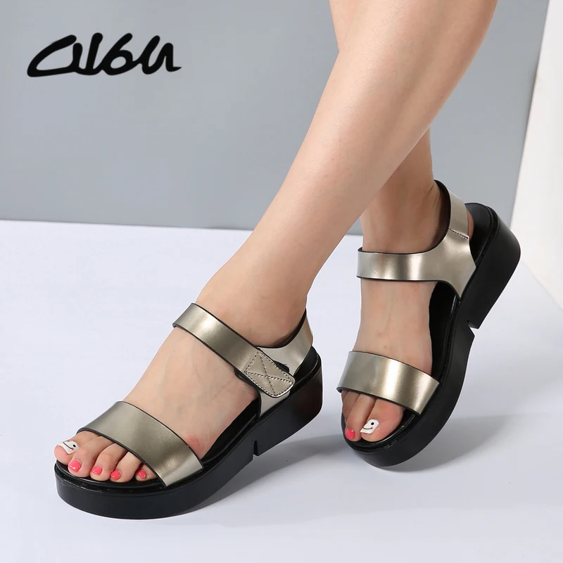 silver and black flat sandals