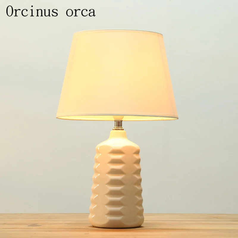 

Nordic simple modern white table lamp bedroom warm bed lamp American creative ceramic decorative table lamp free shipping