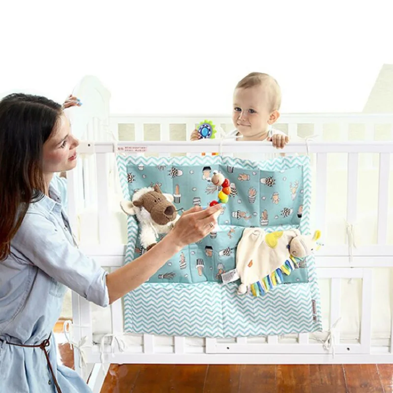 

Crib Baby Bed bumper Hanging Storage Bag Multi-functional Baby Cot pocket Hanging Storage Bag Baby Bedding Bumper 52*56cm